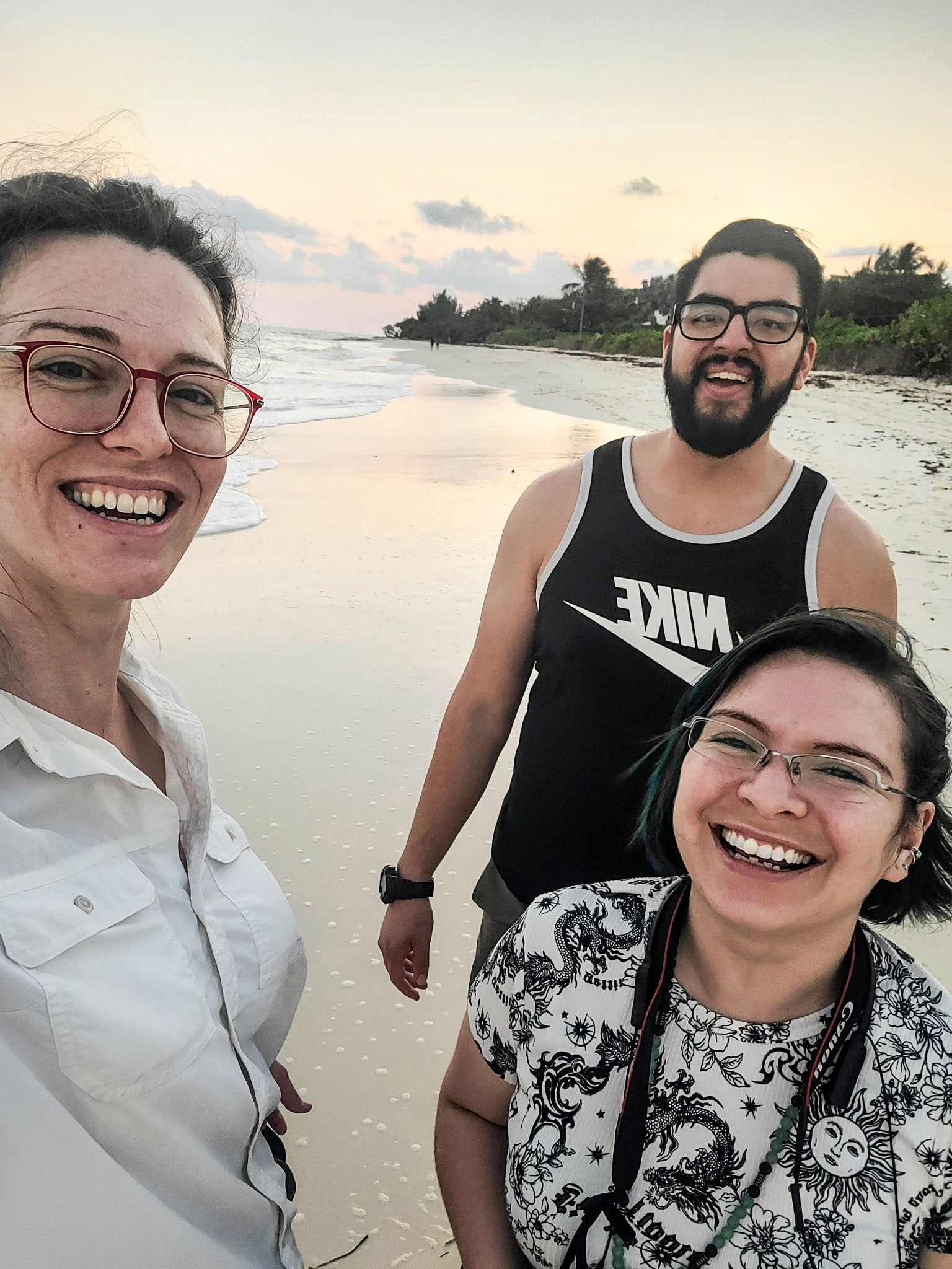 Dr. Rhiannon West, Vincent Benavidez and Jazmyn Gutierrez on a beach in the Bahamas