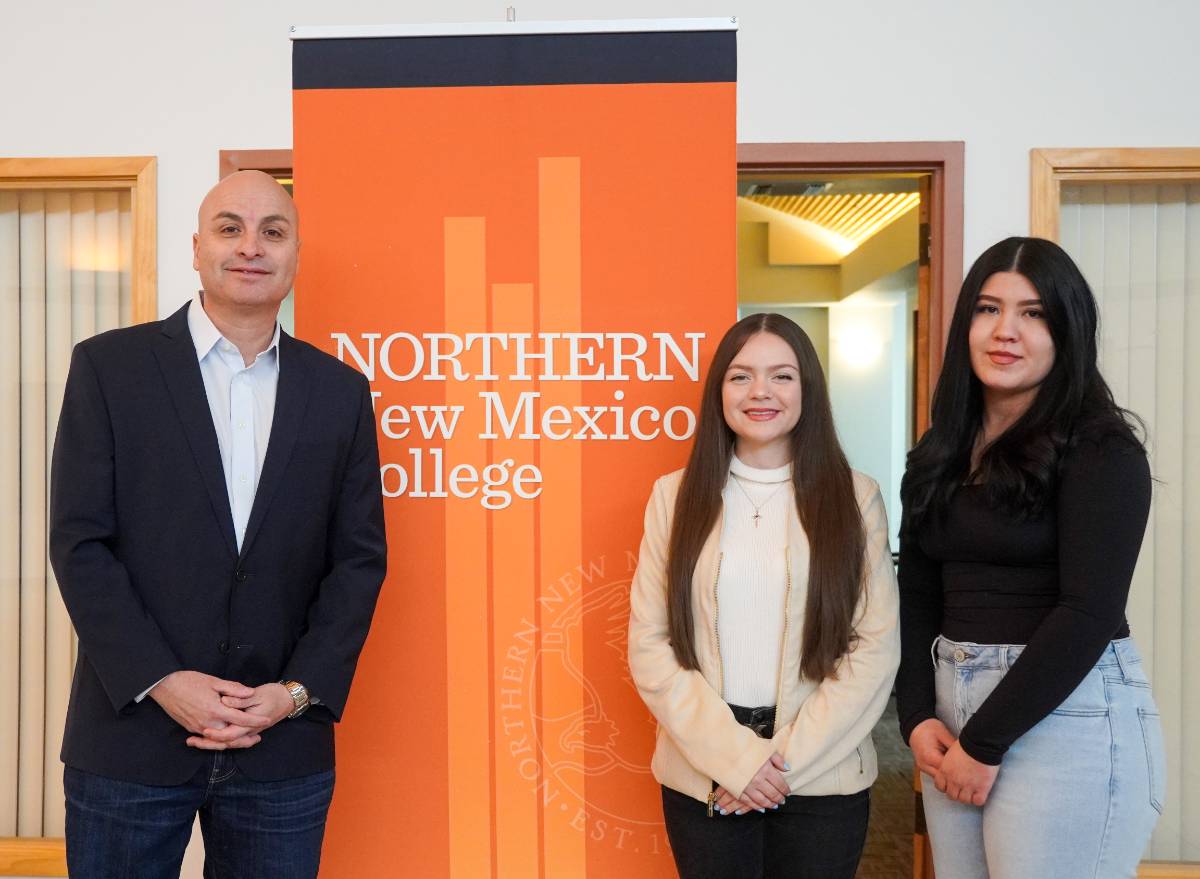 From left: NNMC President Hector Balderas, Jaide Romero and Atalia Archuleta